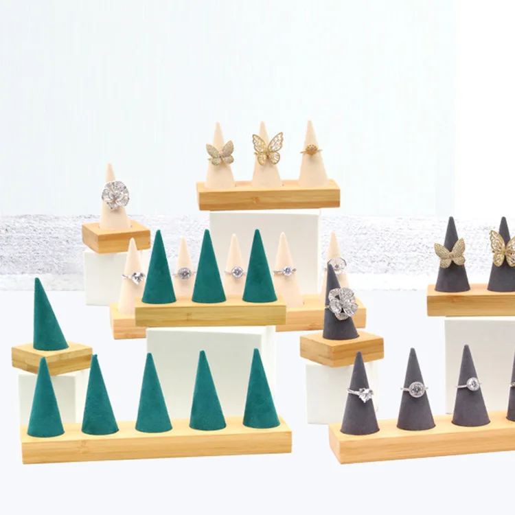 Custom Fashion Conical Popular Velvet Cone Jewelry Display Wooden Ring Holder Ring Display Stand For Beauty goods store
Custom Fashion Conical Popular Velvet Cone Jewelry Display Wooden Ring Holder Ring Display Stand For Beauty goods store