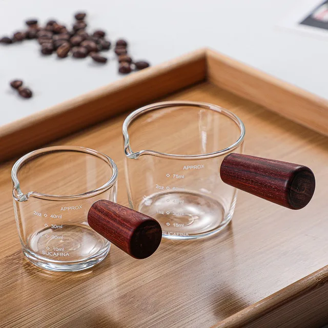 2021 New heat-resistant glass measuring milk coffee cup with wooden handle for milk and coffee, Customized color
2021 New heat-resistant glass measuring milk coffee cup with wooden handle for milk and coffee, Customized color