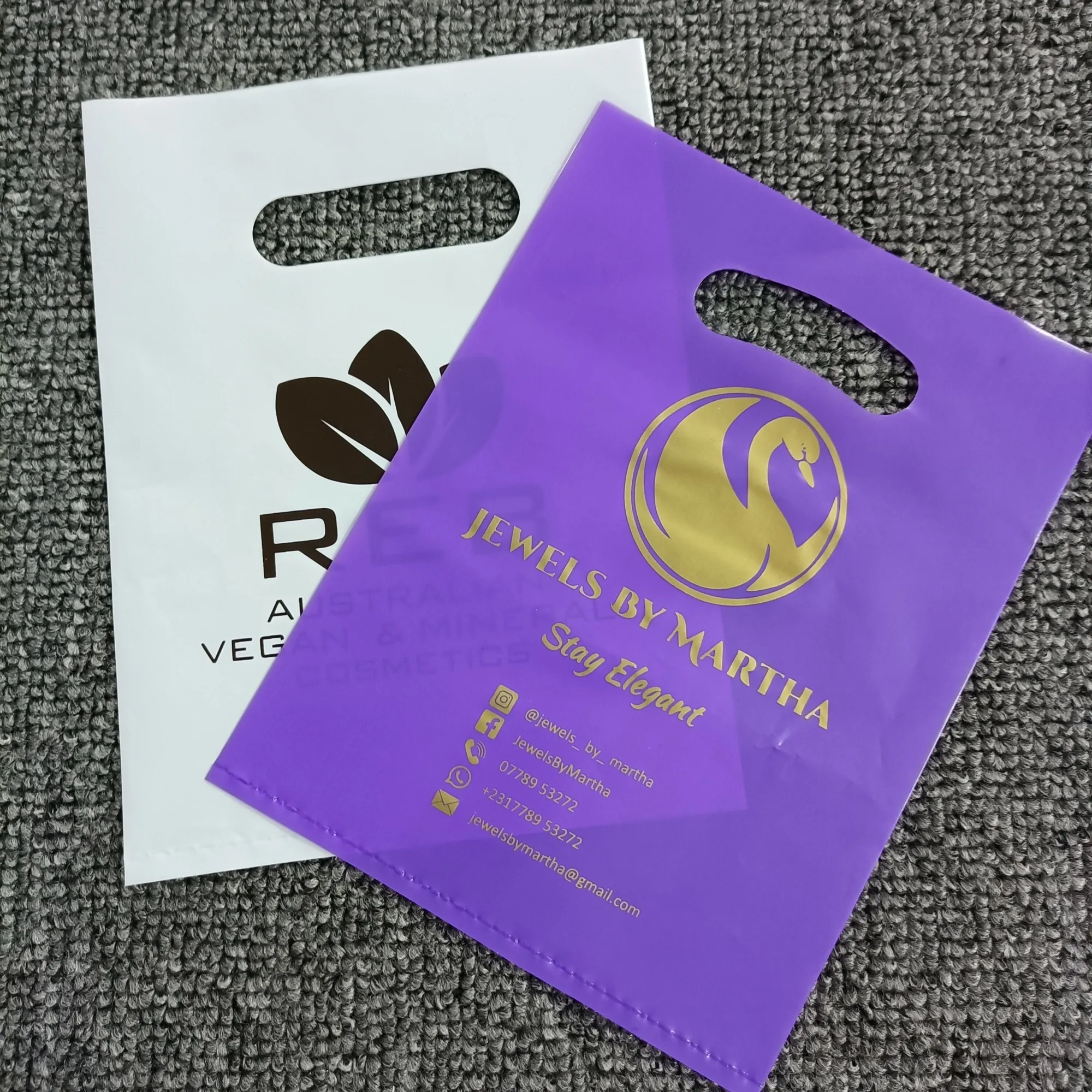Die Cut Handle printed Plastic Shopping /clothing /gift packing Bag customized design
Die Cut Handle printed Plastic Shopping /clothing /gift packing Bag customized design