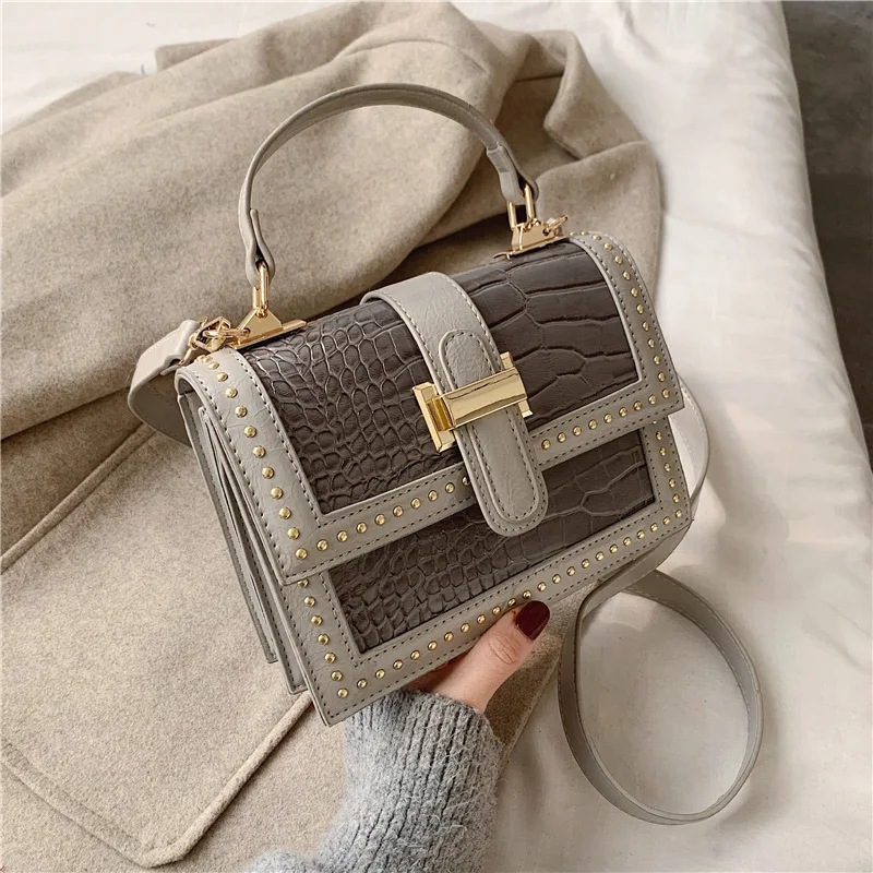 Factory direct sell newest design women handbags PU leather tote bag small square young ladies crossbody bag
Factory direct sell newest design women handbags PU leather tote bag small square young ladies crossbody bag