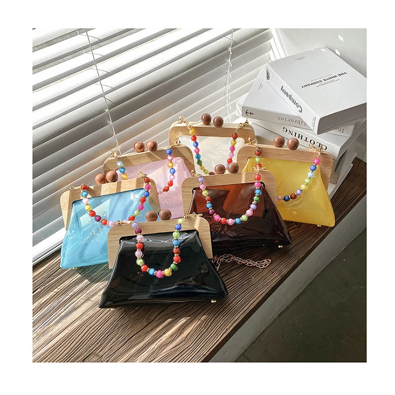 Ins Transparent Acrylic Tote Shell bag 2021 Fashion New PVC Women's Designer Handbag Colorful Beads strap Shoulder Messenger Bag
Ins Transparent Acrylic Tote Shell bag 2021 Fashion New PVC Women's Designer Handbag Colorful Beads strap Shoulder Messenger Bag