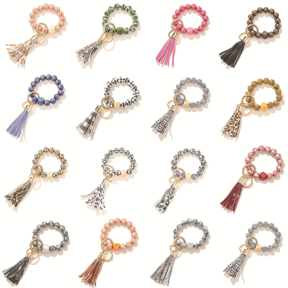 Leopard spotted color wooden bead bracelet keychain velvet tassel pendant bracelet key ring Can add wood disc For DIY
Leopard spotted color wooden bead bracelet keychain velvet tassel pendant bracelet key ring Can add wood disc For DIY