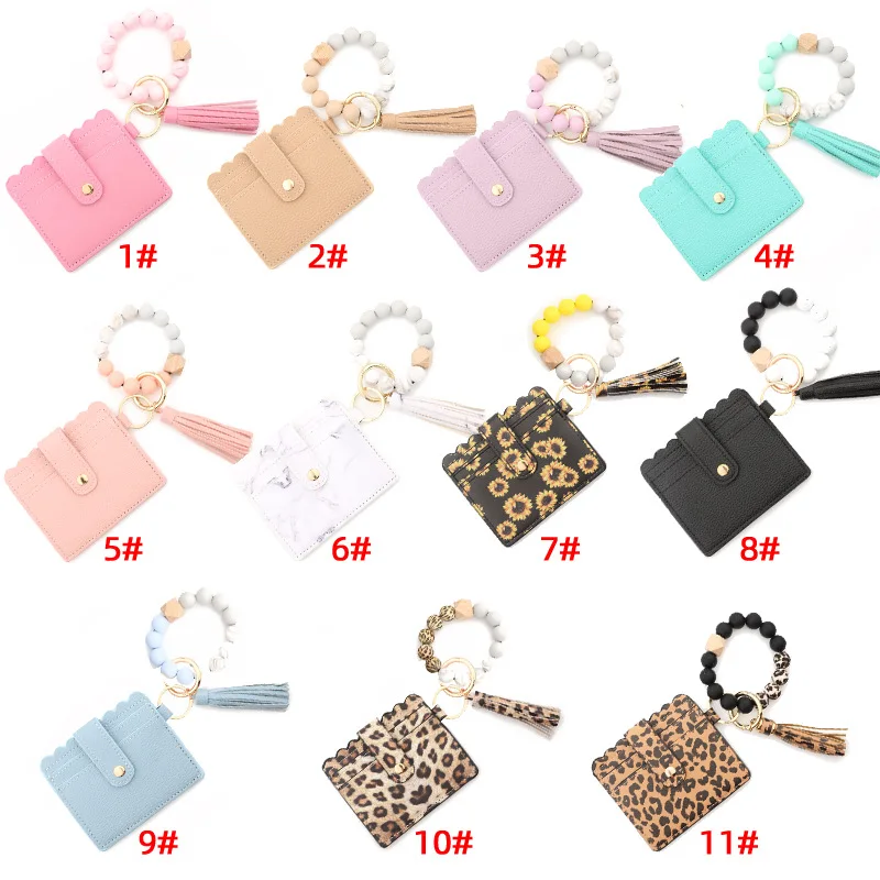 2021 Pu leather cards holder key ring wristlet keychain wood silicon beads bracelet tassel bangle cards holder wallet for women, Candy colors and leopard colors
2021 Pu leather cards holder key ring wristlet keychain wood silicon beads bracelet tassel bangle cards holder wallet for women, Candy colors and leopard colors