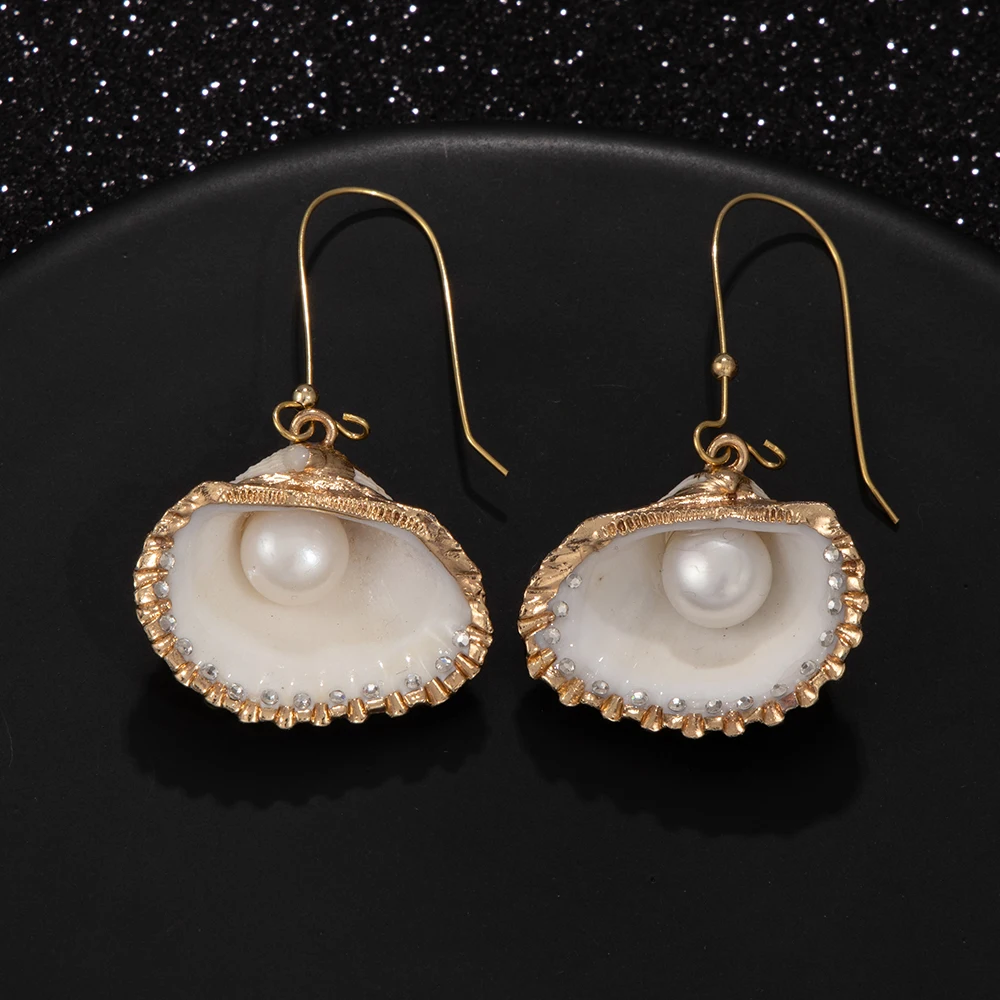 real natural pearl coconut 18k gold plated mother of pearl dangle drop brass earrings
real natural pearl coconut 18k gold plated mother of pearl dangle drop brass earrings