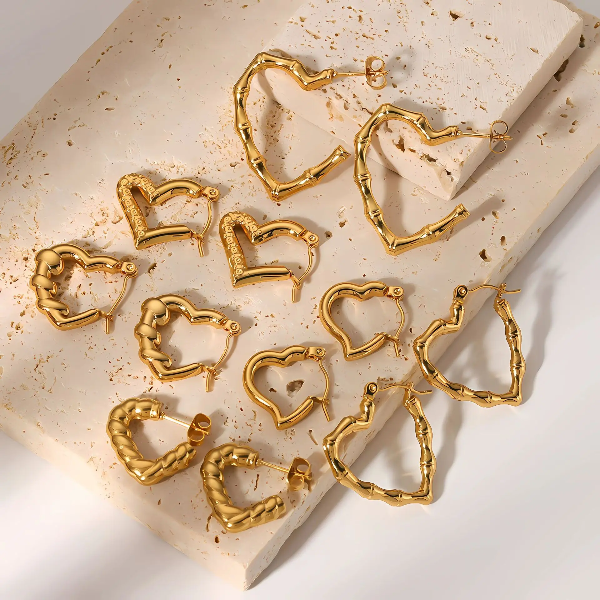 Stainless Steel 18k Gold Heart Hoop Earrings Bread Patterned Bamboo Hollow Heart Earrings for Women
Stainless Steel 18k Gold Heart Hoop Earrings Bread Patterned Bamboo Hollow Heart Earrings for Women