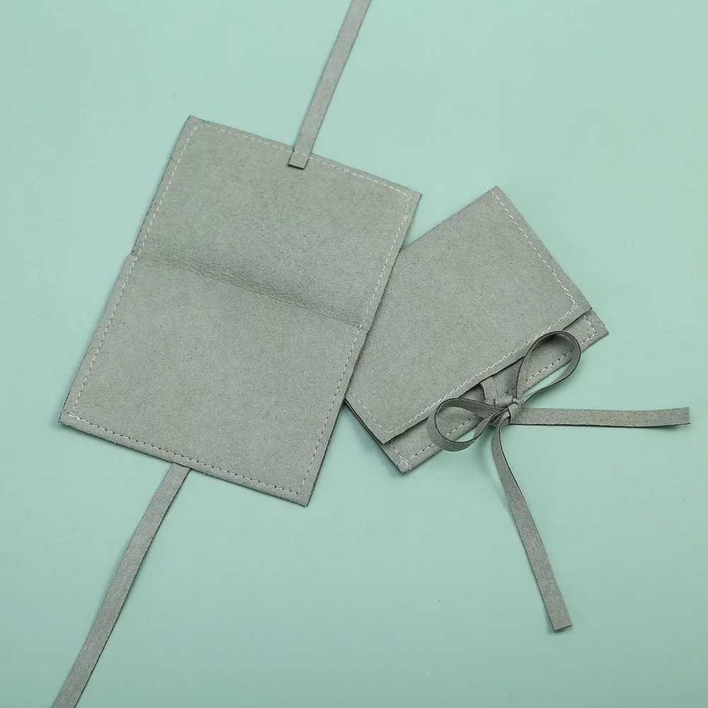 Wholesale Luxury Design Microfiber Jewelry Pouch High Quality Microfiber Jewelry Packaging Bag
Wholesale Luxury Design Microfiber Jewelry Pouch High Quality Microfiber Jewelry Packaging Bag