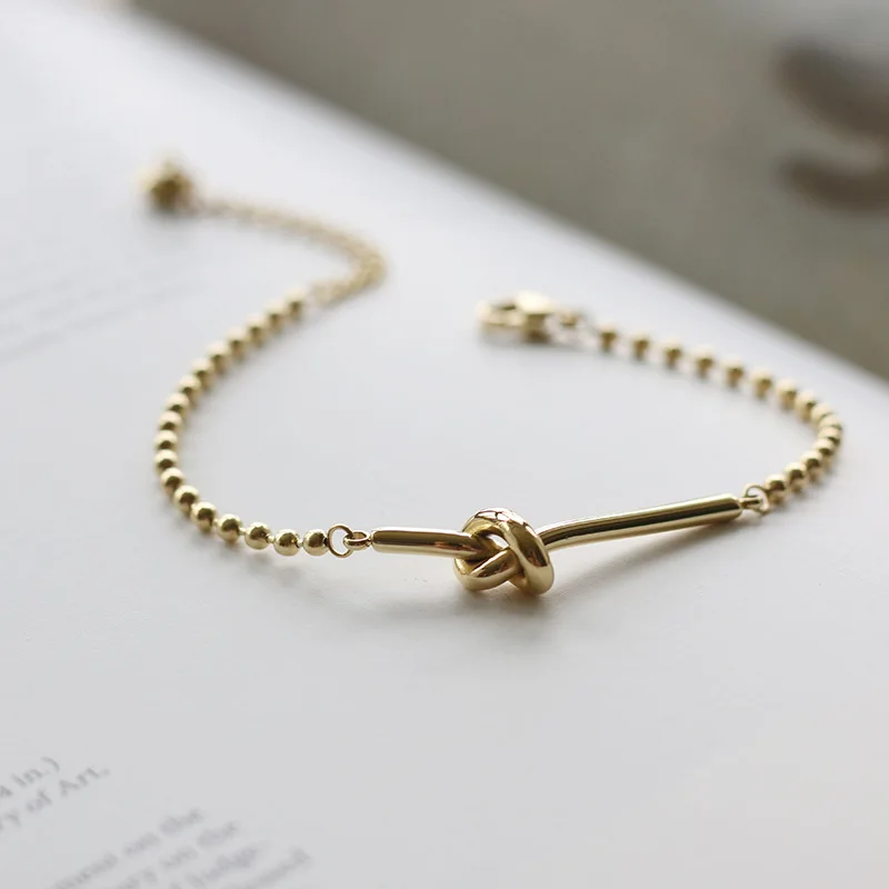 Personality 316L Stainless Steel 14K Gold Knotted Rope Beads Chain Love Knot Bracelet
Personality 316L Stainless Steel 14K Gold Knotted Rope Beads Chain Love Knot Bracelet