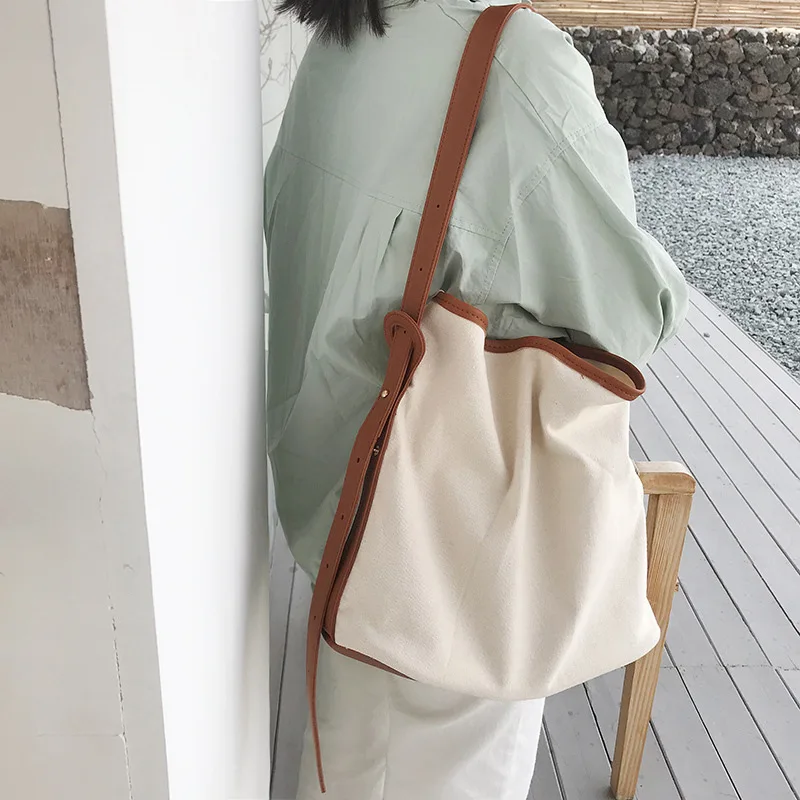 Simple Canvas Bag Female Messenger Shoulder Ins Bucket Bag Large Capacity Shopping
Simple Canvas Bag Female Messenger Shoulder Ins Bucket Bag Large Capacity Shopping