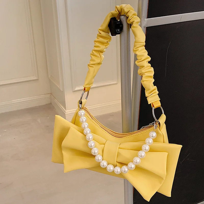 Hot sales personality fashion solid color PU material women handbag simplicity women pearl handbag, Customizable
Hot sales personality fashion solid color PU material women handbag simplicity women pearl handbag, Customizable