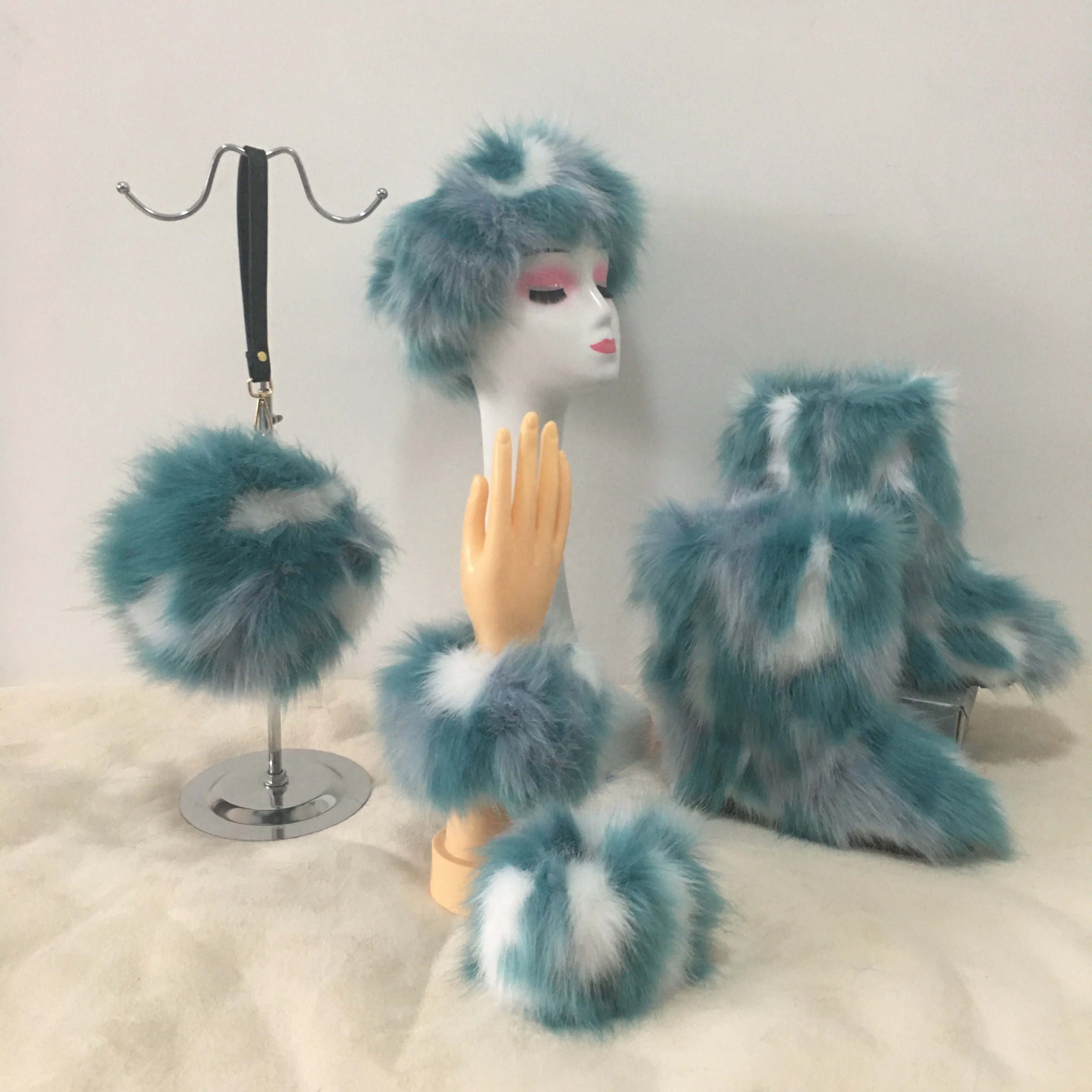 winer boots four piece set Fur boots bag wrist fur headgear winter warm women's suit
winer boots four piece set Fur boots bag wrist fur headgear winter warm women's suit