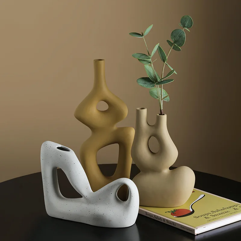 High Quality American Style Special Shaped Abstract Vase Home Decoration Ceramic Crafts Living Room Flower Vase
High Quality American Style Special Shaped Abstract Vase Home Decoration Ceramic Crafts Living Room Flower Vase