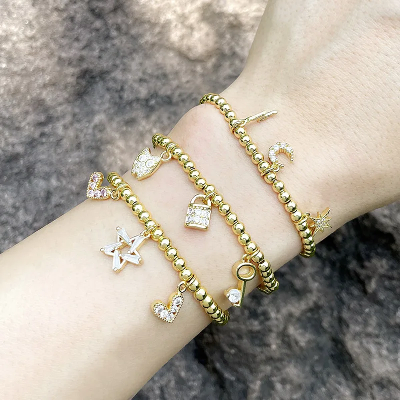 Gold Ball Round Bead Elastic Bracelet Fashion Pink Love Heart Five-Pointed Star Bracelet Female Bracelet, Gold color bracelet
Gold Ball Round Bead Elastic Bracelet Fashion Pink Love Heart Five-Pointed Star Bracelet Female Bracelet, Gold color bracelet