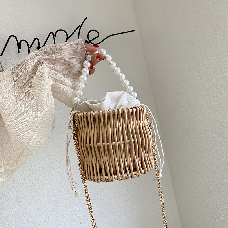 wholesale new style Korean straw woven bag pearl portable bucket bag chain shoulder messenger beach tote bag
wholesale new style Korean straw woven bag pearl portable bucket bag chain shoulder messenger beach tote bag