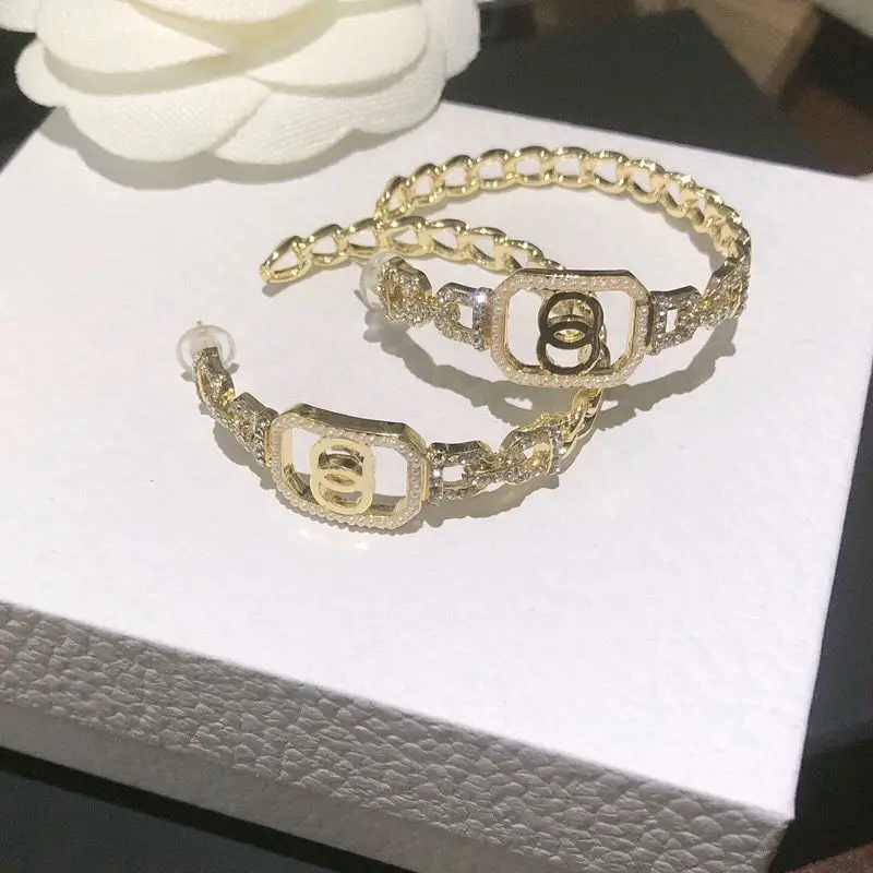 Hot selling fashion lady women diamond unique design brand logo big hoop earrings
Hot selling fashion lady women diamond unique design brand logo big hoop earrings