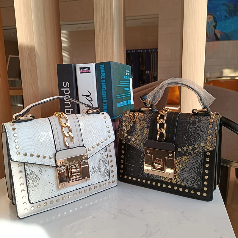 New style lock snakeskin leather bags crossbody purses designer luxury handbag for women with rivet
New style lock snakeskin leather bags crossbody purses designer luxury handbag for women with rivet