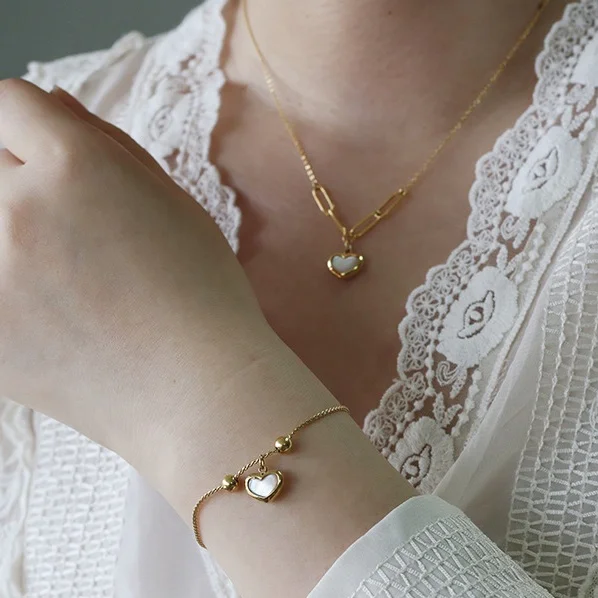 AJ272 Gold Plated Stainless Steel Chain Mother of pearl Heart Pendant Bracelet and Heart Necklace Set, Gold color
AJ272 Gold Plated Stainless Steel Chain Mother of pearl Heart Pendant Bracelet and Heart Necklace Set, Gold color