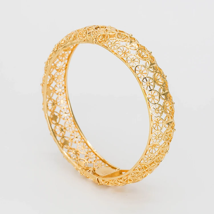 Gorgerous gold copper bangle bracelet circle charm simple hollow pattern gold filled bracelet for ladies
Gorgerous gold copper bangle bracelet circle charm simple hollow pattern gold filled bracelet for ladies