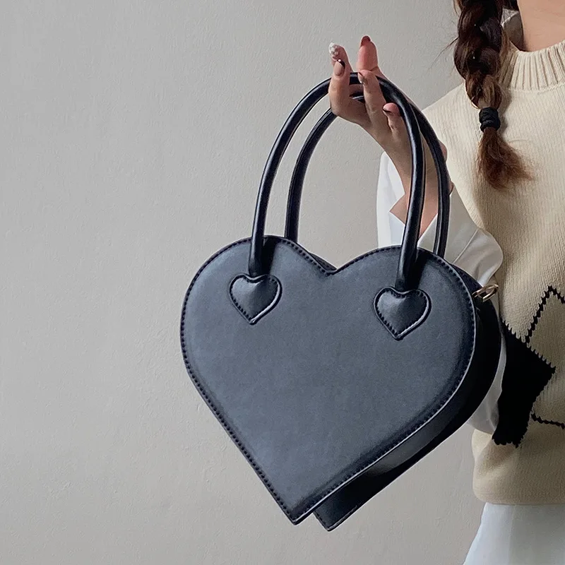 Unique Designer Heart shape bag women's 2022 new fashion simple handbag retro black shoulder purses and bags ladies
Unique Designer Heart shape bag women's 2022 new fashion simple handbag retro black shoulder purses and bags ladies
