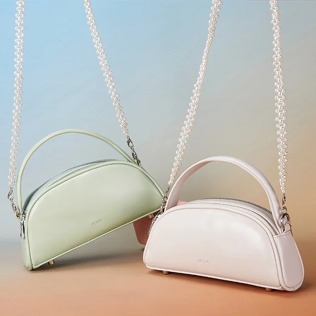 2022 spring summer hot selling light solid color single shoulder bag pearl chain temperament all-match lady messenger handbag
2022 spring summer hot selling light solid color single shoulder bag pearl chain temperament all-match lady messenger handbag
