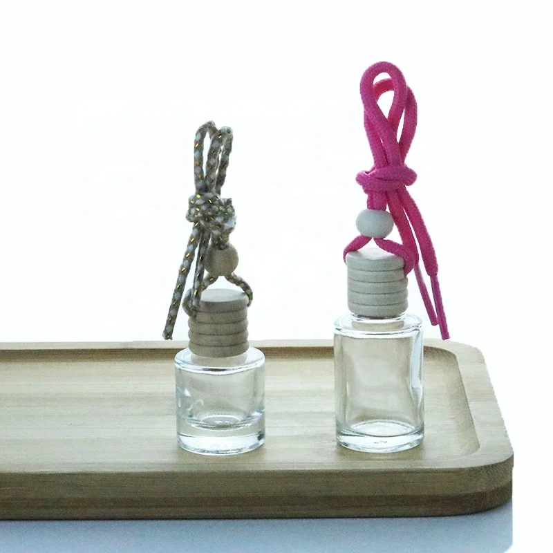 Low MOQ Mini Swing Top Glass Bottle 5ml 8ml Cylinder Clear Glass Car Perfume Bottle With Wooden Cap For Essential Oil (CG01B)
Low MOQ Mini Swing Top Glass Bottle 5ml 8ml Cylinder Clear Glass Car Perfume Bottle With Wooden Cap For Essential Oil (CG01B)