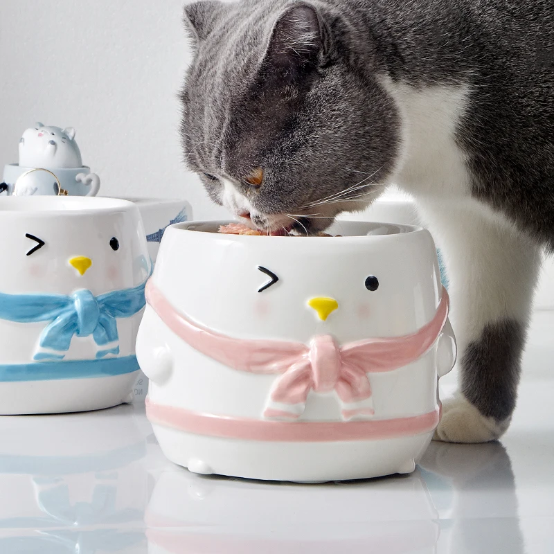 Cute popular ceramic pet bowl penguin shape thickened anti-fall dog bowl raised non-slip cat bowl
Cute popular ceramic pet bowl penguin shape thickened anti-fall dog bowl raised non-slip cat bowl
