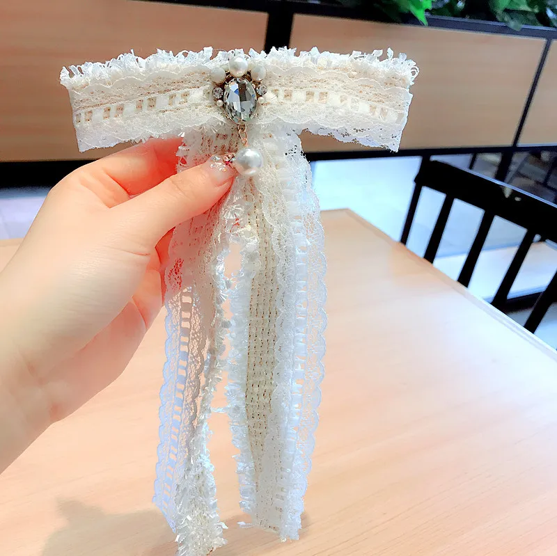 15CM*24.5CM Korean bow bowknot collar necktie snow white lace fabric flower water drop long ribbon crystal pearl brooch corsage, Picture
15CM*24.5CM Korean bow bowknot collar necktie snow white lace fabric flower water drop long ribbon crystal pearl brooch corsage, Picture