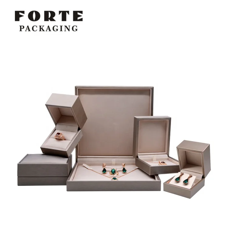 FORTE joyeros gold OEM custom PU Leather pendant 'jewerly' box Earrings rings jewelry box With Logo
FORTE joyeros gold OEM custom PU Leather pendant 'jewerly' box Earrings rings jewelry box With Logo