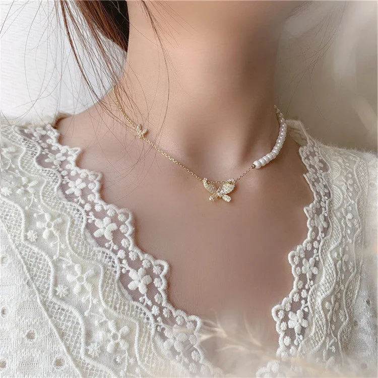 Elegant Ladies Jewelry Crystal Butterfly Rhinestone Pendant Necklace Imitation Pearl Beaded Chain CZ Butterfly Necklace
Elegant Ladies Jewelry Crystal Butterfly Rhinestone Pendant Necklace Imitation Pearl Beaded Chain CZ Butterfly Necklace