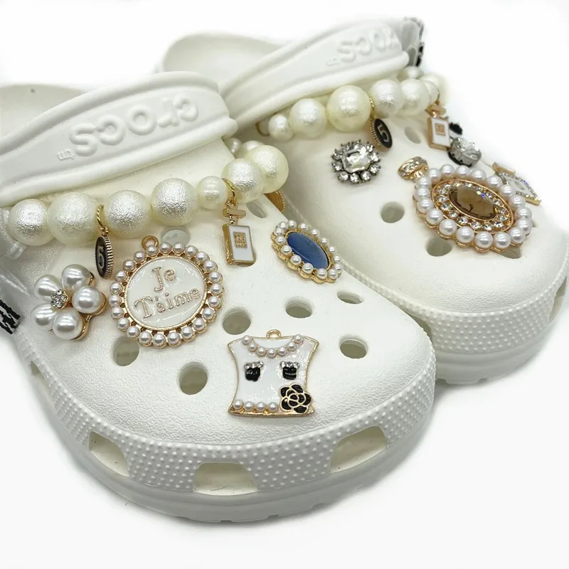 2021 wholesale custom pearl gold designer croc pieces shoe charms for shoe decoration
2021 wholesale custom pearl gold designer croc pieces shoe charms for shoe decoration