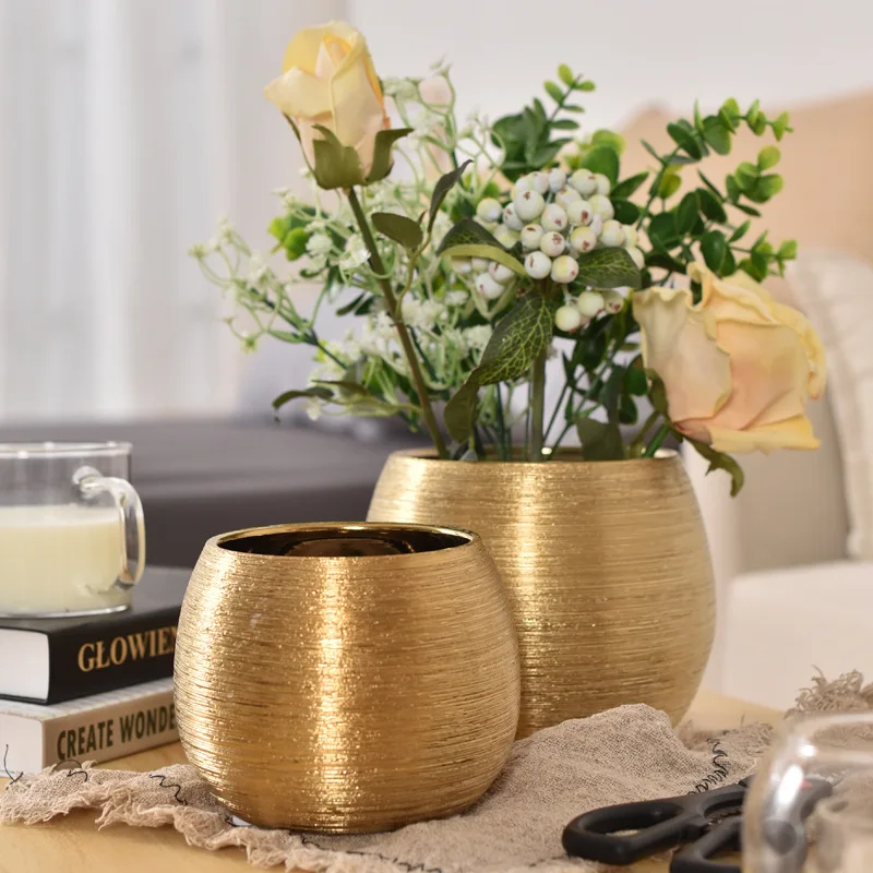 Nordic display ceramic flowerpot decorative living room plant vase gold plated wire-drawing flowerpot
Nordic display ceramic flowerpot decorative living room plant vase gold plated wire-drawing flowerpot