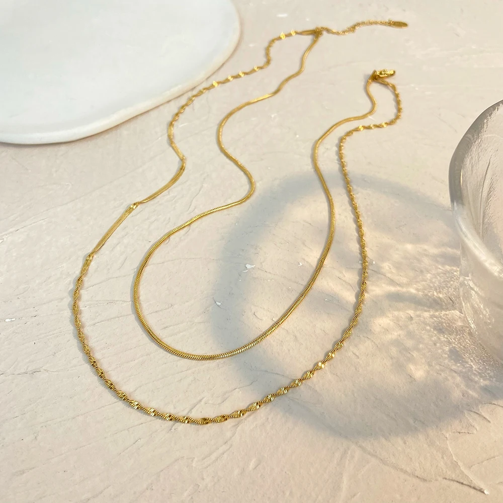 Titanium steel jewelry Double layer flat snake bone necklace Women's minimalist stainless steel gold-plated necklace
Titanium steel jewelry Double layer flat snake bone necklace Women's minimalist stainless steel gold-plated necklace