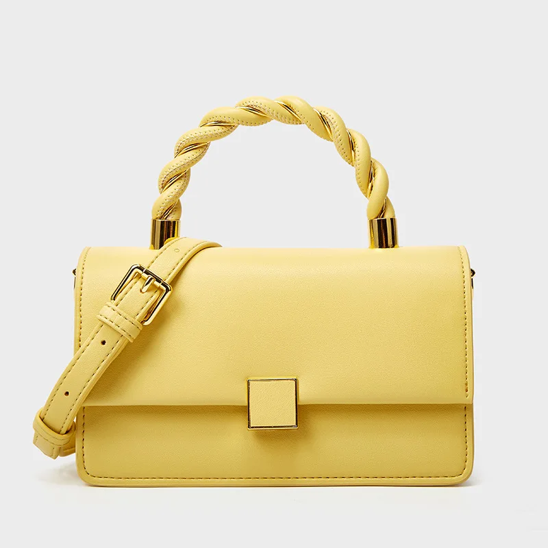Manufacture of new twist handle personality temperament cross-body bag high - class envelope small square bag
Manufacture of new twist handle personality temperament cross-body bag high - class envelope small square bag