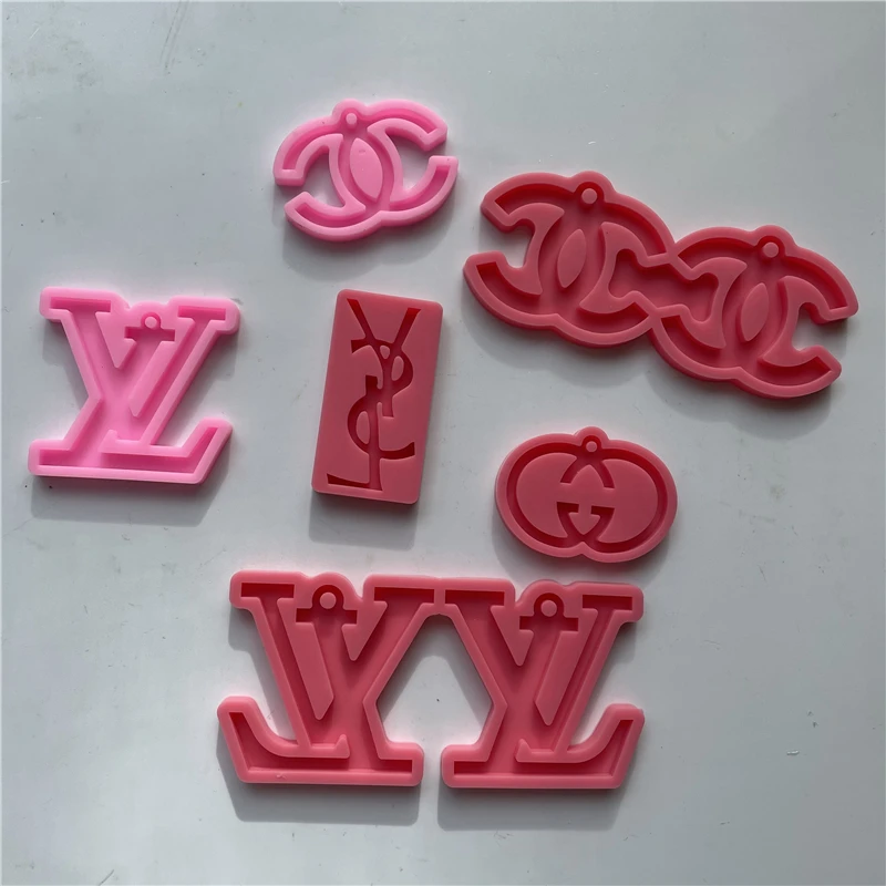 Hot Sale Designer Silicone Keychain mold Logo Brand earring silicone resin mould for resin molds
Hot Sale Designer Silicone Keychain mold Logo Brand earring silicone resin mould for resin molds