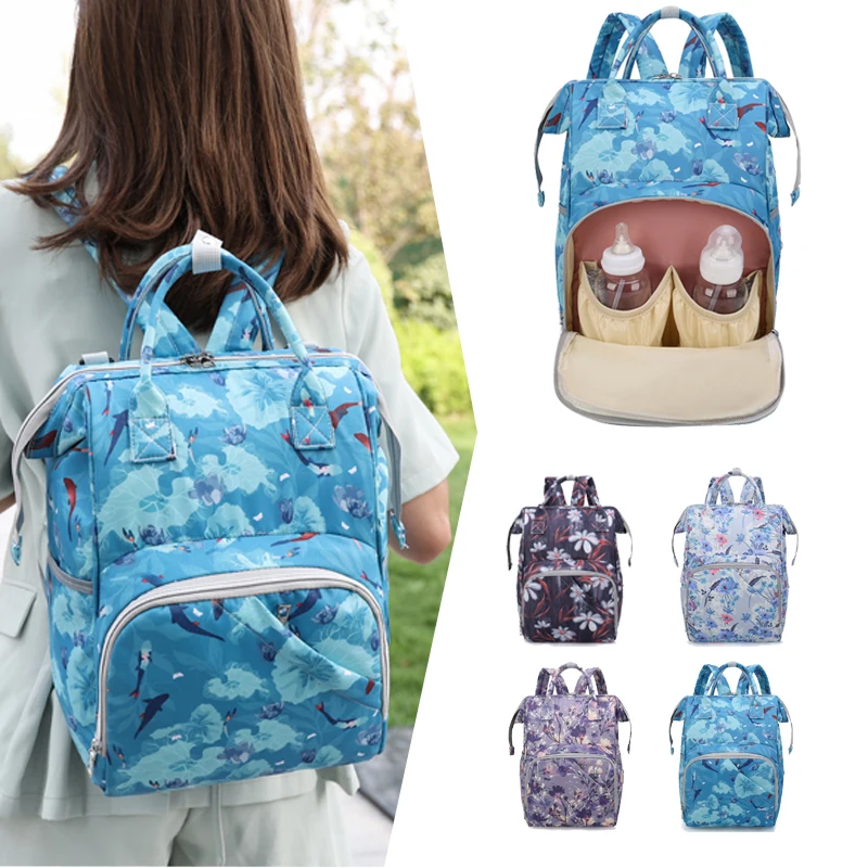 Multifunction large capacity full flower printed waterproof mommy bag backpack diaper bag with stroller strap
Multifunction large capacity full flower printed waterproof mommy bag backpack diaper bag with stroller strap