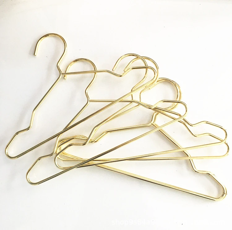 Hooks for Pet Clothes Pet clothing hanger Dog clothes Mini metal small clothing hanger Gold cat Teddy display clothes Hanging
Hooks for Pet Clothes Pet clothing hanger Dog clothes Mini metal small clothing hanger Gold cat Teddy display clothes Hanging