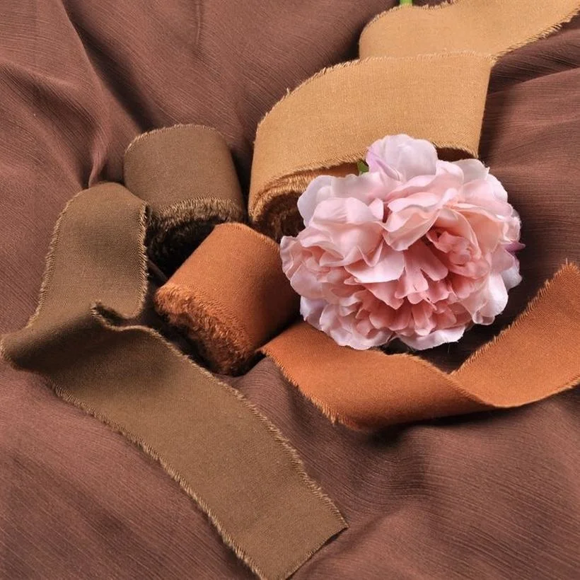 Raw edge ribbons custom natural cotton brown crepe ribbon for wedding decoration, Customized color
Raw edge ribbons custom natural cotton brown crepe ribbon for wedding decoration, Customized color