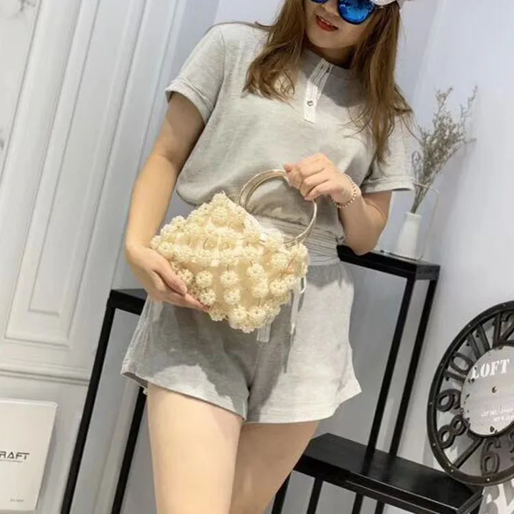 2021 Xianjian vintage pearl beaded party purse bag white pearl beads beach clutch purse evening bags
2021 Xianjian vintage pearl beaded party purse bag white pearl beads beach clutch purse evening bags
