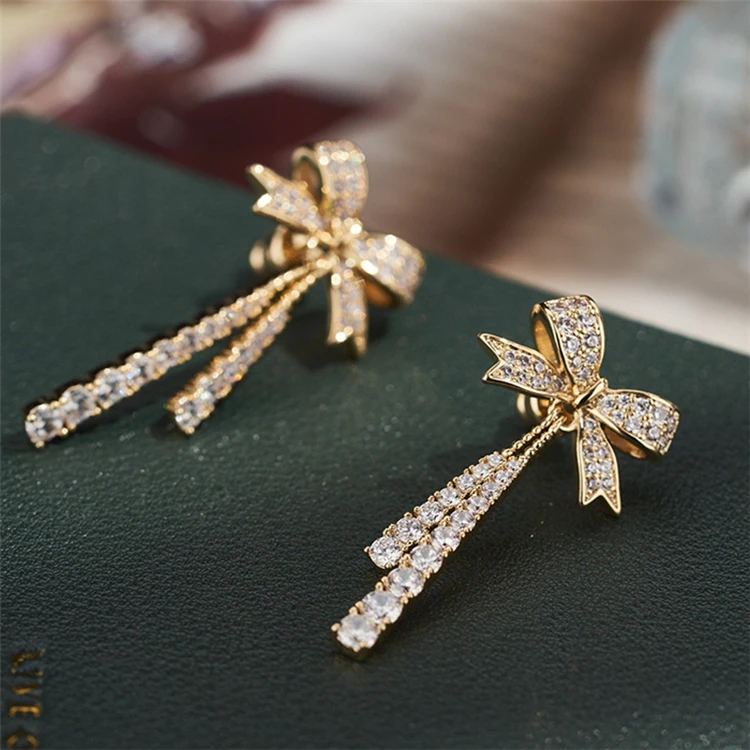 Aimgal Jewelry 3EX zircon 18K gold plated Bowknot tassel 925 silver needle earrings women
Aimgal Jewelry 3EX zircon 18K gold plated Bowknot tassel 925 silver needle earrings women