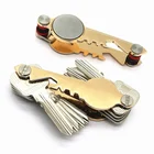 Wholesale smart design compact custom logo zinc alloy key shaped magnet key holder organizer