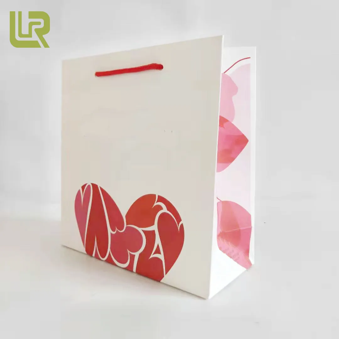 material and popular design high quality ivory board paper bag