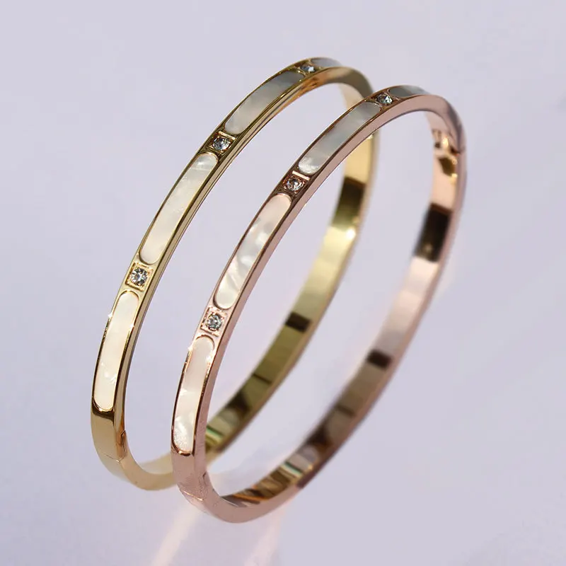 New Trendy 316L Stainless Steel Natural Shell CZ Letter V 18k gold plated cuff bangle bracelets for women jewelry
New Trendy 316L Stainless Steel Natural Shell CZ Letter V 18k gold plated cuff bangle bracelets for women jewelry