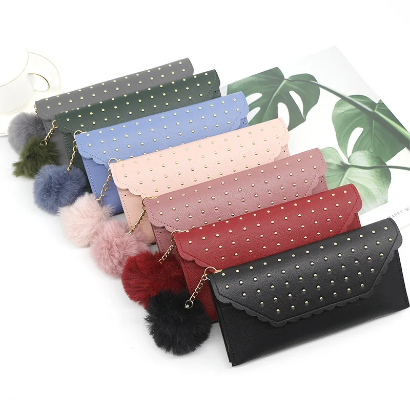 Fashionable new ladies wallet purse rivet pure color hair ball purse hand bag women long card wallet for wom 2020
Fashionable new ladies wallet purse rivet pure color hair ball purse hand bag women long card wallet for wom 2020