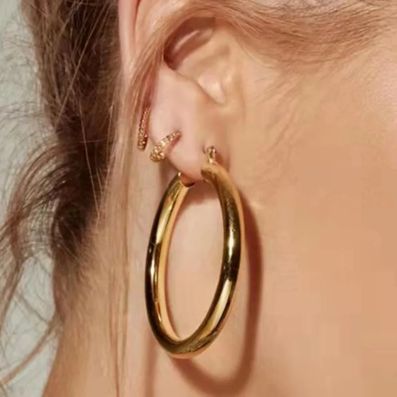 New Trendy Earring 18K Gold Plated Simple Smooth Big Hoop Earrings for Women Stainless Steel Earrings Wholesale
New Trendy Earring 18K Gold Plated Simple Smooth Big Hoop Earrings for Women Stainless Steel Earrings Wholesale