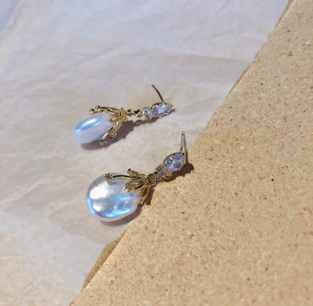 2019 new products 14K gold Baroque real pearl earrings S925 sterling silver needle cold wind personality earrings
2019 new products 14K gold Baroque real pearl earrings S925 sterling silver needle cold wind personality earrings