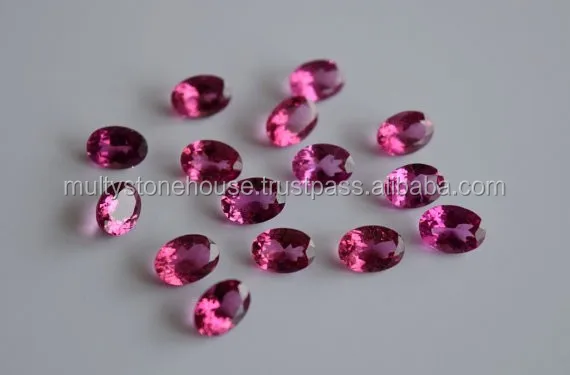 Rubylite tourmaline cut oval gemstone,nice colour with slight inclusion, aprpox size 5x7mm, approx weight of pcs 0.70 carat, price per pcs 55 (2).jpg