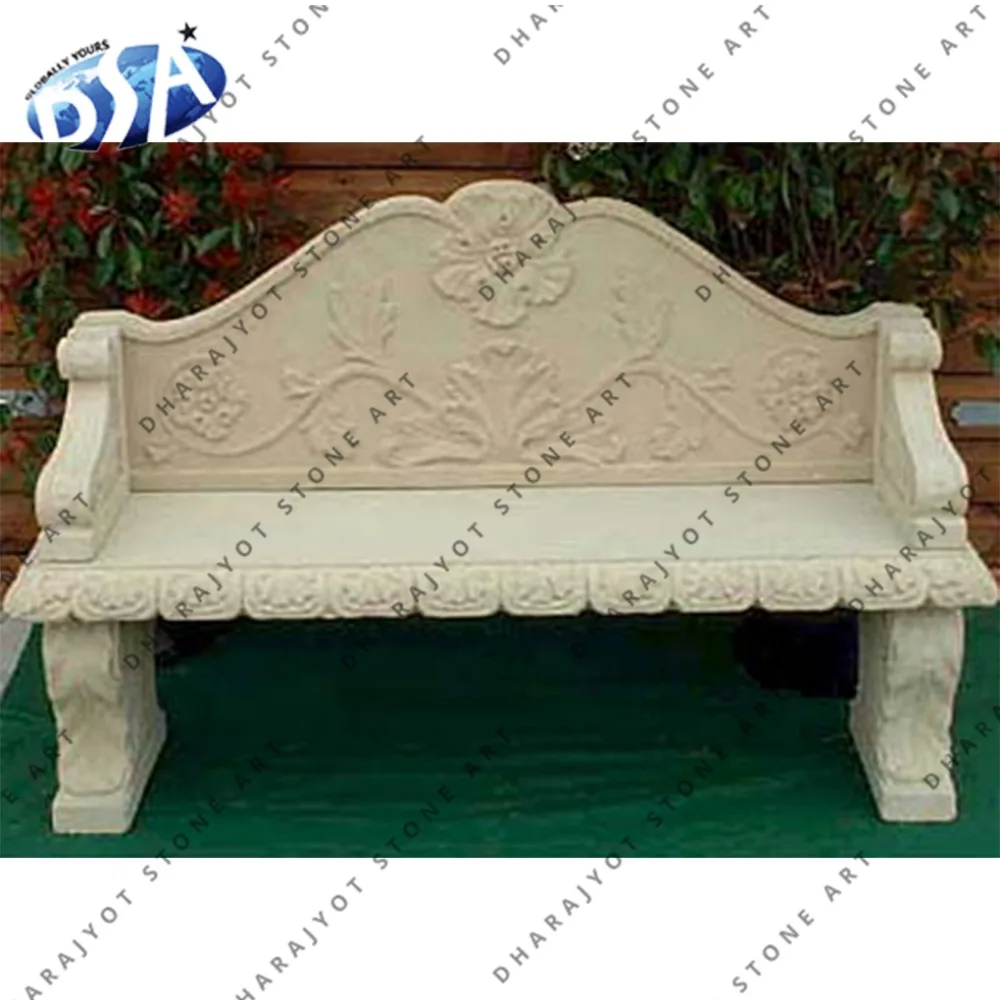 carved cream sandstone garden bench with hand rest