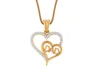 Double Heart Gold Diamond pendant in 14 karat Yellow Gold with DAD initials