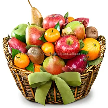 rattan basket full of fresh organic fruits stock