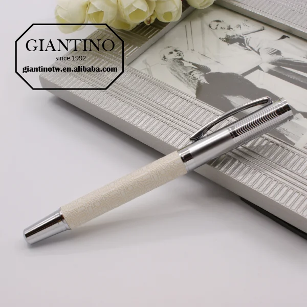 metal roller pen with white leather barrel