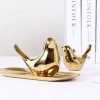 Nordic creative golden ceramic bird ornaments modern minimalist living room home soft decorations
Nordic creative golden ceramic bird ornaments modern minimalist living room home soft decorations